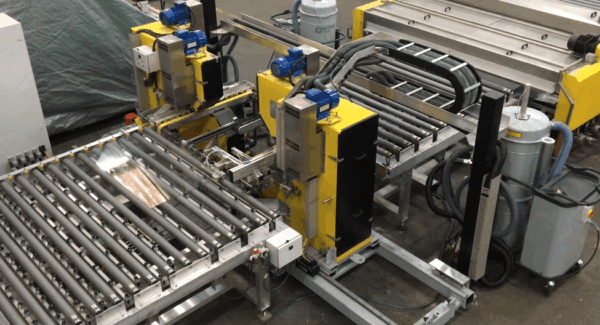 HepcoMotion - Hostile glass seaming application requires heavy duty, corrosion resistant modular solution